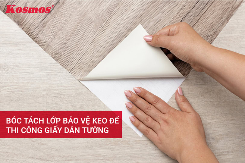 Proceed to peel off the protective layer of glue to apply wall decoration paper