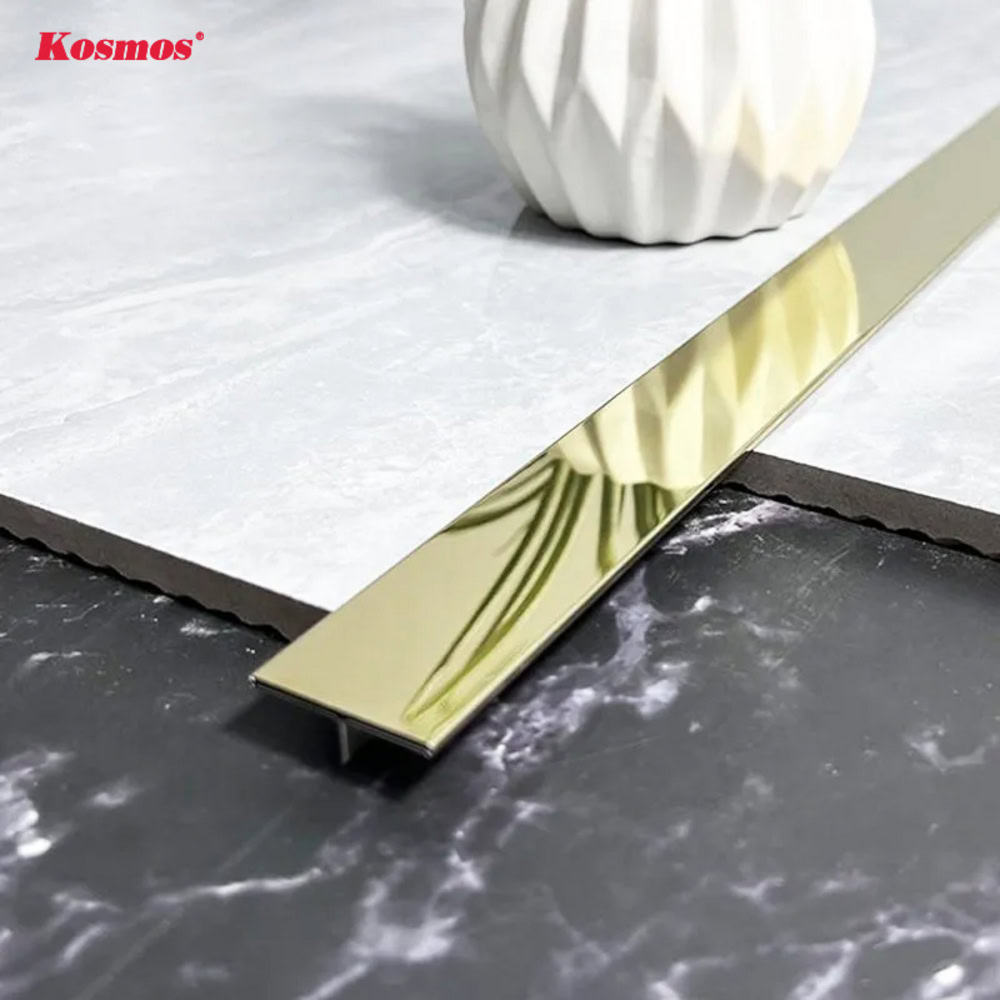 Nẹp t inox vàng gương kích thước 10x5mm dùng để trang trí khe hở giữa 2 tấm ốp tường, ván lót sàn. Nẹp t inox vàng gương kích thước 10x5mm dùng để trang trí khe hở giữa 2 tấm ốp tường, ván lót sàn.