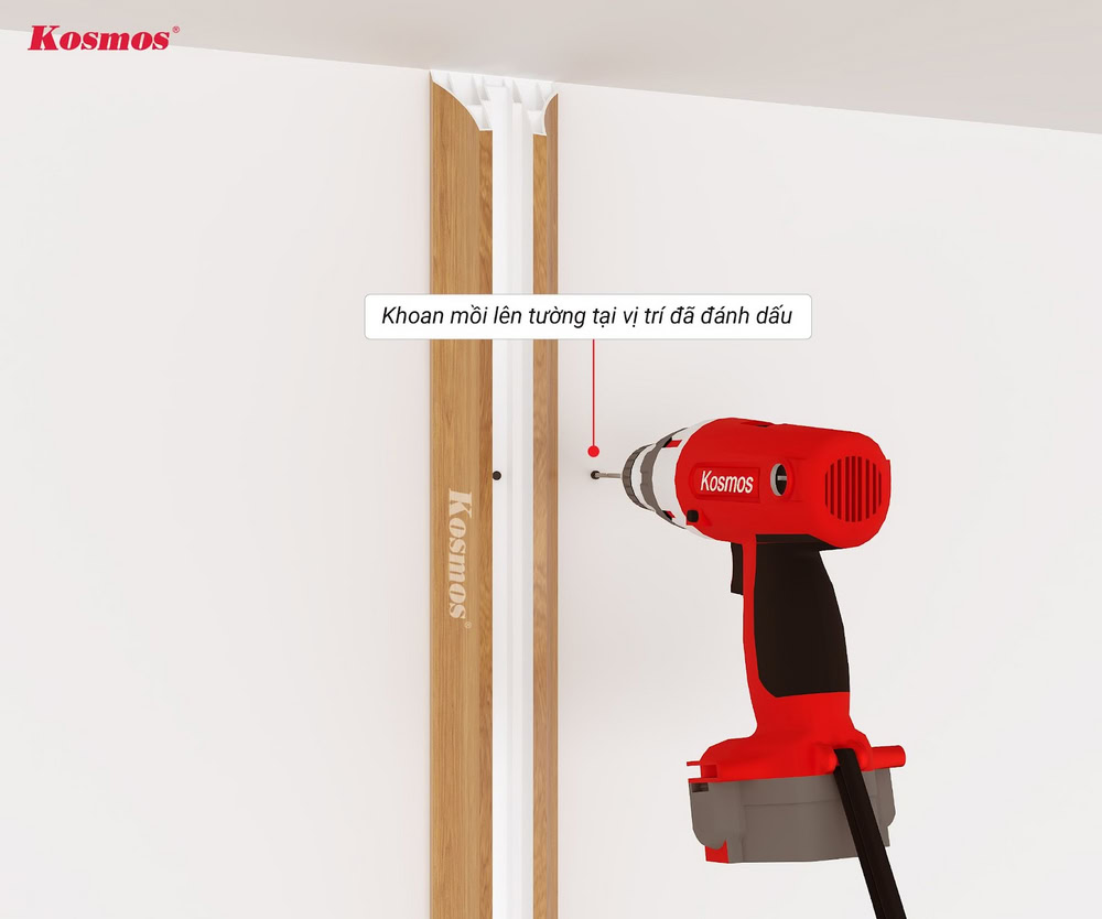 Khoan lỗ tại các điểm đã đánh dấu trên công trình để đóng tắc kê sắt/tắc kê nở.