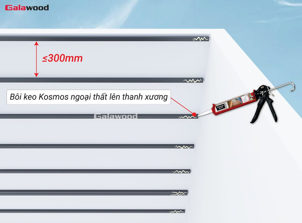 Bôi keo vào khung xương khi thi công tấm ốp nhựa asa trên trần