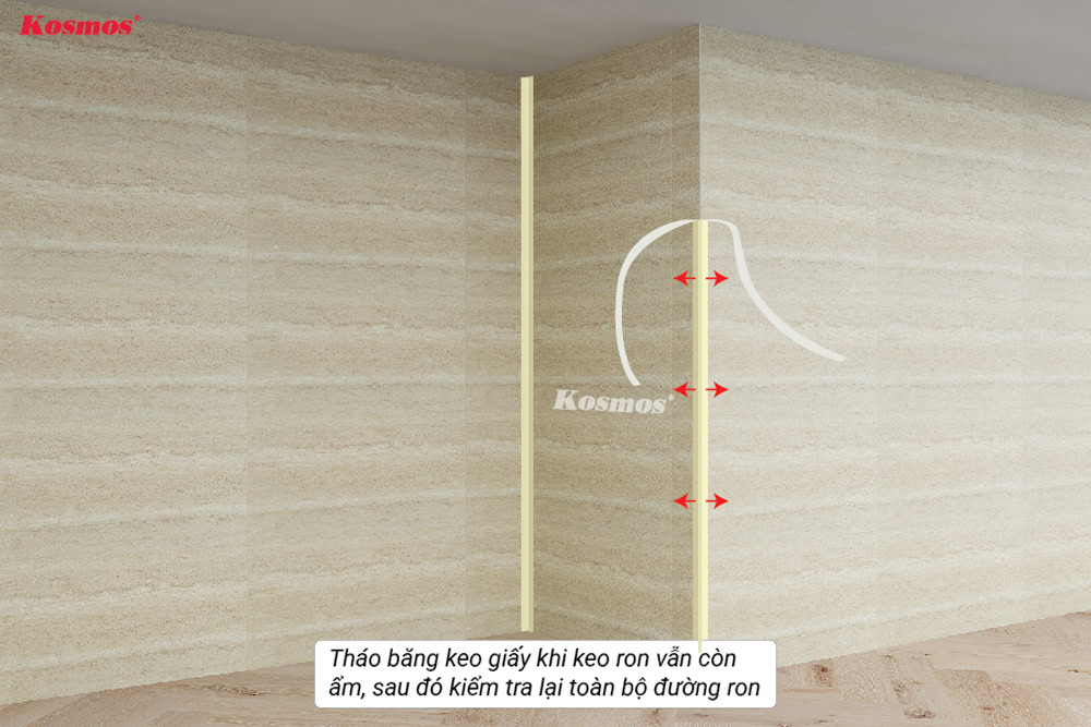 Dùng súng bắn đinh cố định tạm thời ở mép trên tấm ốp Dùng súng bắn đinh cố định tạm thời ở mép trên tấm ốp