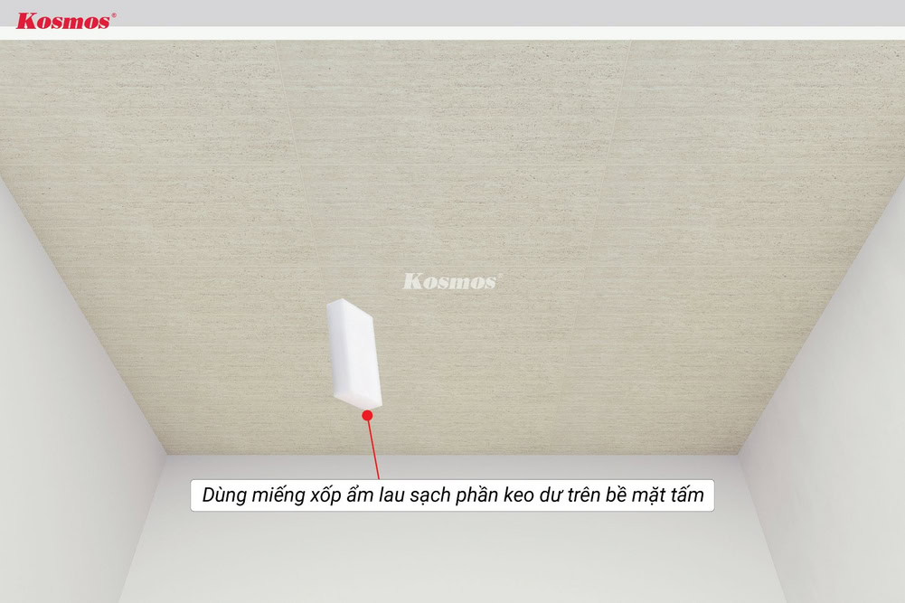 Dùng miếng xốp ẩm lau sạch phần keo dư trên bề mặt tấm