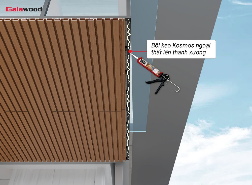 Thao tác bôi keo lên khung xương trước khi lắp tấm ốp G-4S219X25 diễn ra liên tục