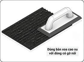 voi-dong-co-go-noi-dung-ban-xoa-cao-su-mem-de-ep-vao-cac-khe-ranh-de-dam-bao-keo-dinh-100-dien-tich